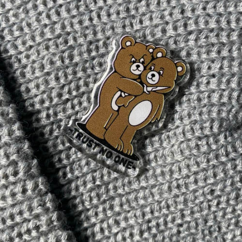 TRUST NO ONE ACRYLIC PIN